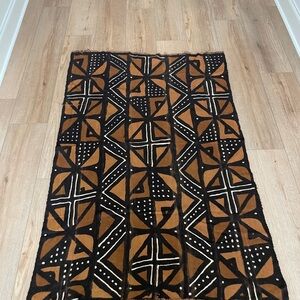 African mud cloth. Purchased from an antique dealer.